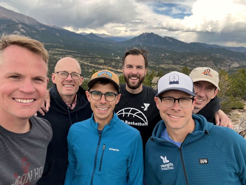 Six members of the Gatewood Seminar together outdoors, mountains behind them